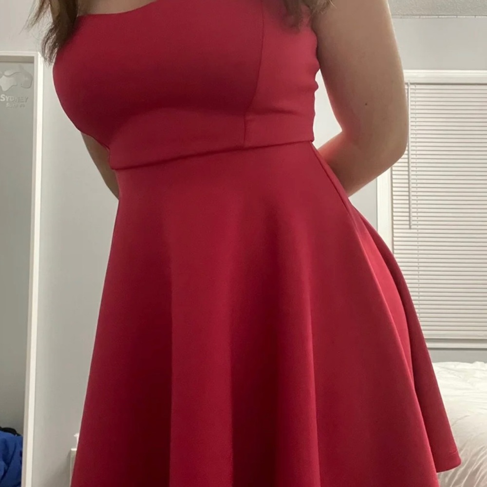 Bright pink strapless dress. Bust includes padding+non-slip grip.